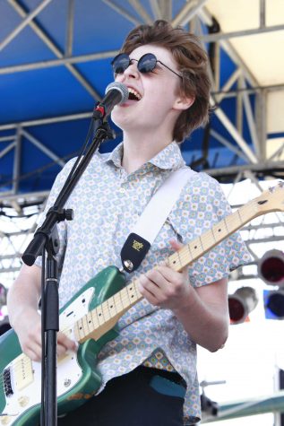 Theatre sophomore Ben Rothschild sings during Jumbo Shrimp’s performance at SunFest on Sat. May 2.
