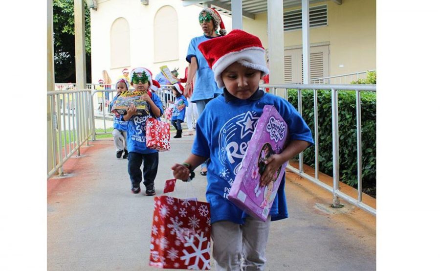 Children happily return to their preschools after a day of winter themed fun at the Title 1 Party put on by ARTS Club in association with NHS and Key Club.