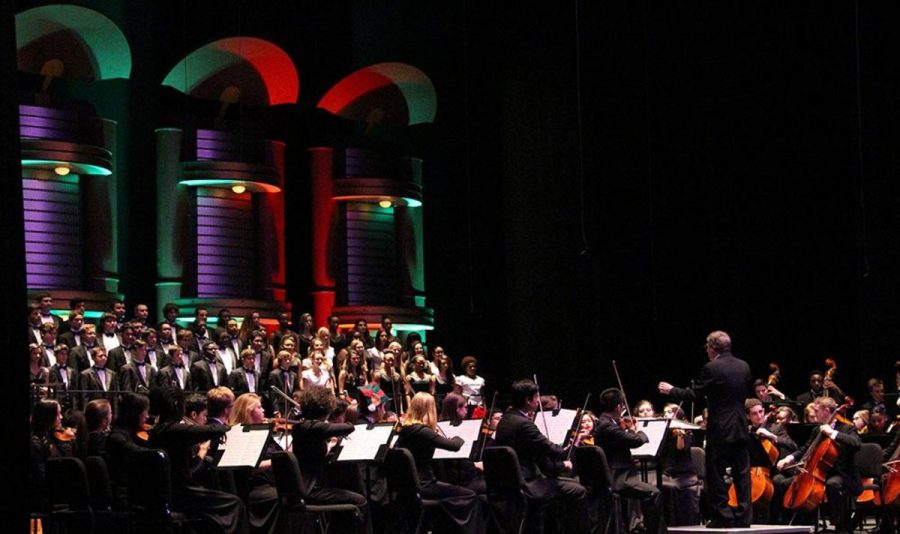 The Philharmonic Orchestra and the DSOA Choir perform Deck The Halls, for the finale of  Prism.