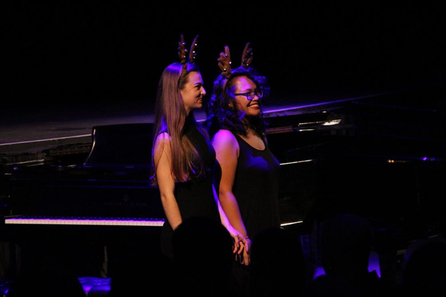 Keyboard juniors Lauren Hamett and Kristen Batalla take in the applause after performing their piece.