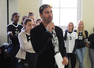 Girls soccer coach Stephen Anand announces the team's triumph in making it to Regionals. There was a mini pep rally during lkunch today in the cafeteria, commemorating the acomplishment of our soccer team. Come out and support our team tonight at Olympic Heights High School in Boca Raton, at 7 p.m.