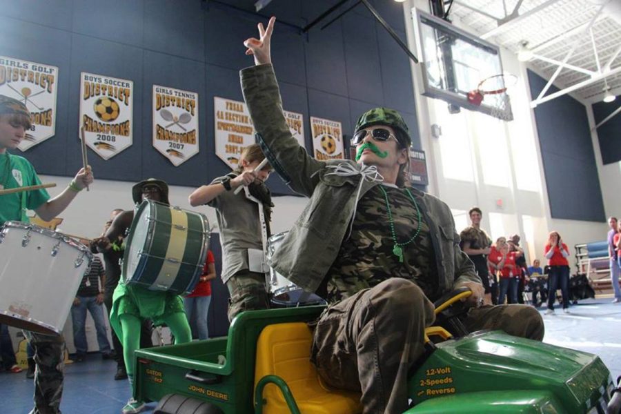 English teacher Nieves Lopez as an Army commander for the sophomore class during the Teacher Dress- Up.