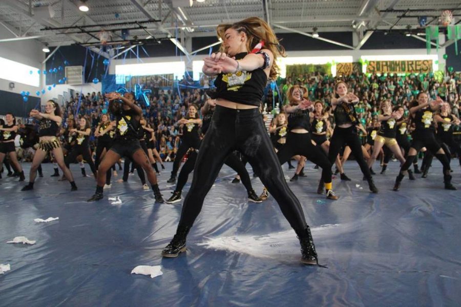 Dance senior Angelina Granitz performing as part of the senior dance during the Pep Rally. 