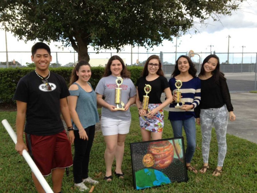 Strings senior Justin Velazquez, keyboard senior Briana Seanor, communications senior Josie Russo, visual seniors Jessica Roses and Candace Roy with strings junior  Xin Yue Yuan after their SECME competition. 