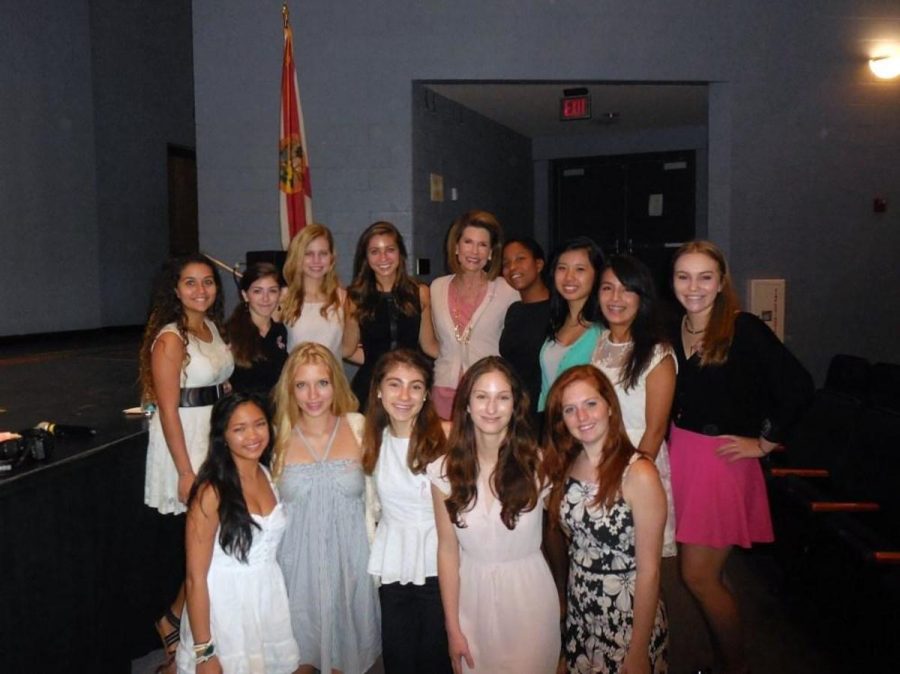 The board members for the ThinkPinkKids Club and the Womens Empowerment Club with Ambassador Nancy Brinker after her key note speech. 
(From left, back row) Strings junior Fabiola Plaza, communications sophomore Taylor Rich, strings senior Rachel Randolph, communications senior Sydney McAuliffe, strings senior Giselle Graham, keyboard sophomore Catherine Zeng, communications junior Maria Grosso, and visual arts junior Emily Gerstein. (From left, front row) Strings senior Kaye Guardiario, digital media sophomore Beatrice hood, strings sophomore Juliet Schriber, theatre senior Katherine Schauer, and theatre junior Katelyn Megan Walsch. 