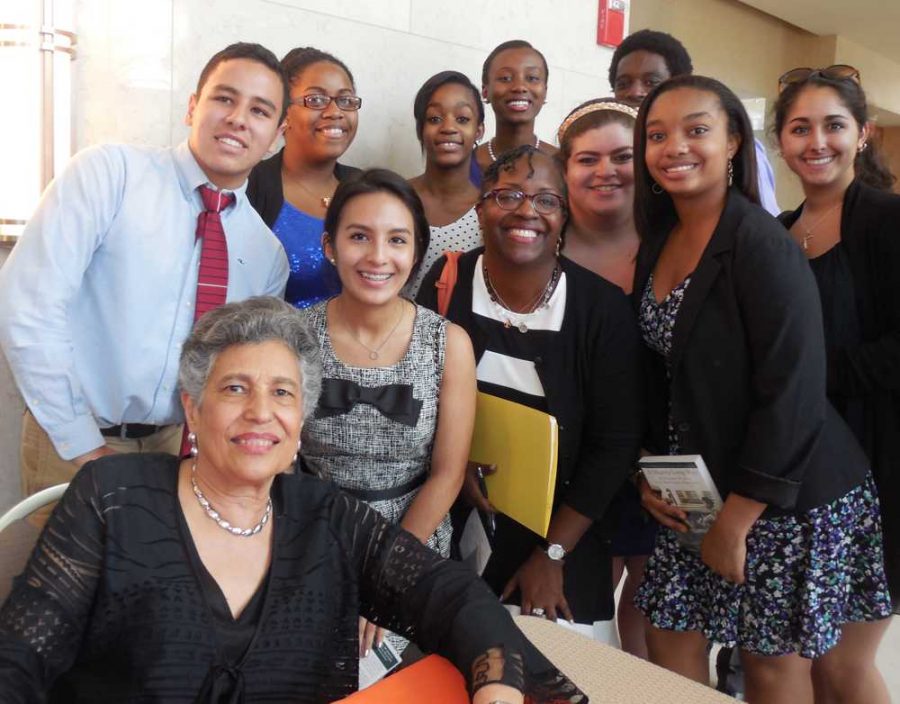 (From top left) Band junior Angelo Sierra, communications junior Ebony Lewis, dance junior Taejia Duffus,   vocal junior Dominique Smith, theatre sophomore Dylan Jackson, strings junior Miriam Wagner, theatre junior Elisabeth Christie and band junior Kara DeVivo. (In front) Ms. Carlotta Walls LaNier, communications junior Maria Grosso and social studies teacher Lea Jefferson. 