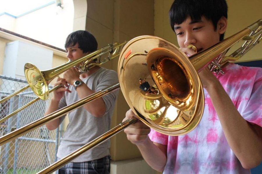 Band+junior+Martin+Nguyen+%28right%29+and+band+sophomore+Connor+Ingham+%28left%29+practice+for+%0A%0Aorchestral+excerpts+to+improve+their+musicianship.