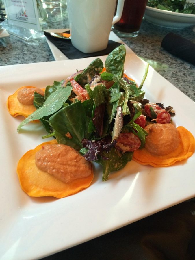 Butternut Squash Raw-violi: cashew parmesan, pesto, red pepper cream, sprouts, basil cashew cheese, side house salad.