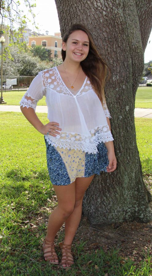 Communications+sophomore+Margot+Heiser+wore+a+white+lace+bohemian+top+with+a+floral+skirt+and+multiple+rustic+accessories+to+fit+her+ensemble.%0A%E2%80%9CMy+family+is+from+France+so+I+get+a+lot+of+my+stuff+there%2C%E2%80%9D+Heiser+said.+%E2%80%9CI+got+this+shirt+at+a+market+in+the+south+of+France.+I+got+my+necklace+from+nature+store+and+its+%5Bmade+of%5D+amber.+The+rings+are+from+a+store+called+Nirvana+and+they+have+the+best+jewelry+ever.+This+skirt+is+from+an+LF+sale+which+is+a+store+at+downtown+Gardens.+My+shoes+are+from+Nordstrom.%E2%80%9D%0AAs+most+fashionistas+do%2C+Heiser+uses+her+love+of+funky+patterns+as+a+way+to+express+herself.%0A%E2%80%9CI+like+dressing+up%2C%E2%80%9D+Heiser+said.+%E2%80%9CIt+describes+your+personality+and+it+can+show+people+who+you+are.%E2%80%9D