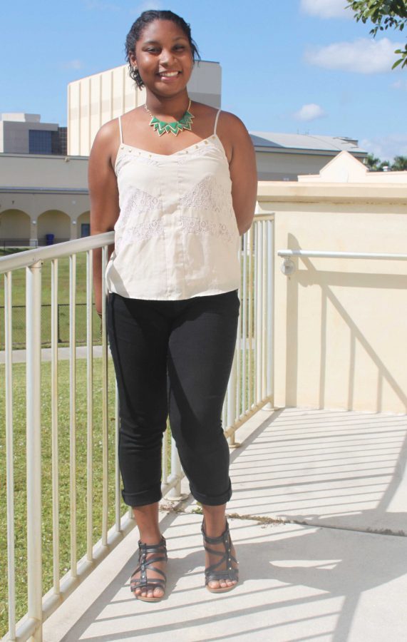 The Outfit of the Day is a new running feature where we showcase the fashion of Dreyfoos. Features and photo staffer Karai Mclean documents the unique outfits of the students and staff. Check every Tuesday, Thursday and Friday for a new update.

	Communications sophomore Marie-Claire Medard wore a simple and classic outfit. Her white top was adorned with golden studs and lace patterns on Nov. 7. Her black jeans and sandals gave the outfit a simple look while her forest green necklace and golden bangles made the outfit pop. 
	 “I got my top and jeans from Forever 21,” Medard said. “My necklace and bracelets are from Charming Charlie, my earrings are from Kohls and my shoes are from Tillys.”