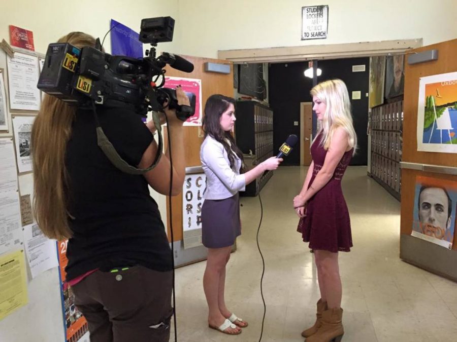 Communications senior Haley Lickstein (l-r) interviewing visual arts senior and YoundArts finalist Catrina Crawford for Channel 5 news. 