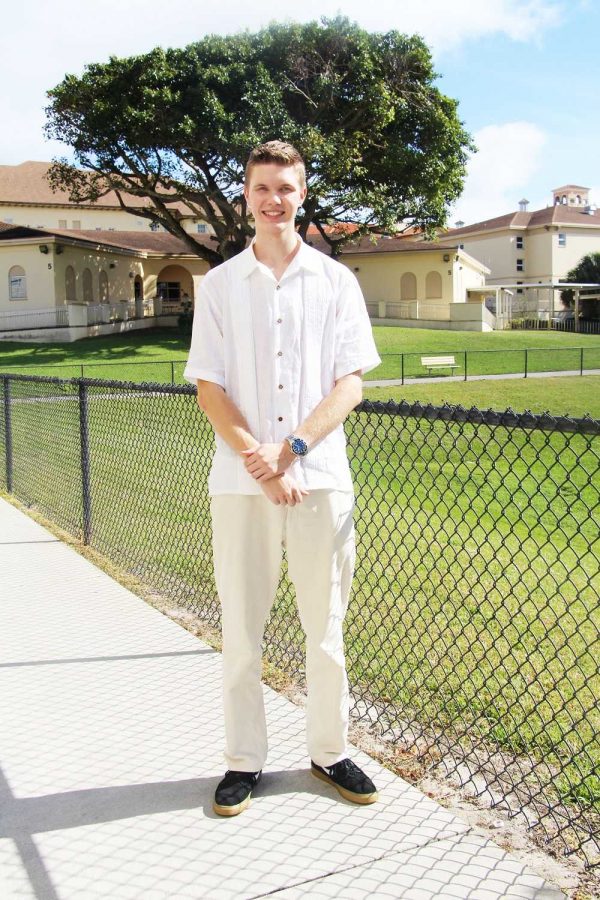 Communications junior Will Fritz wearing commemorative white clothing  to honor the lives of Alex and Jackie Berman. 