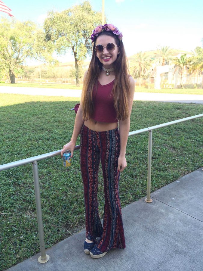 Dance junior Kelsey Kummerlen shows off her indie style by wearing a floral headband, patterned palazzo pants and navy wedges. 
“I was basically wearing all Pac-Sun,” Kummerlen said. “And my mom’s choker.”
Additionally, Kummerlen was eager to start this year’s spirit week as a junior. 
“I’m just really excited that it’s spirit week,” Kummerlen said. 
