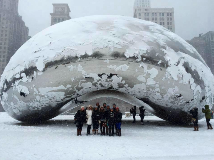 Theatre seniors stand in front of The Bean in Chicago. 