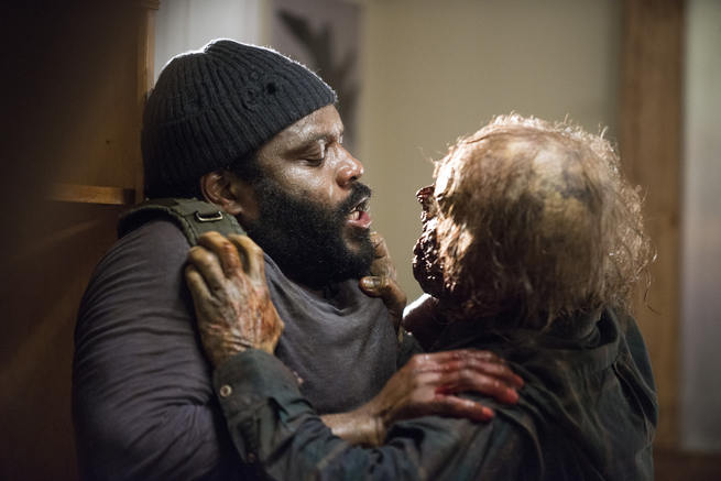 Tyreese fends off walker.
Photo by AMC