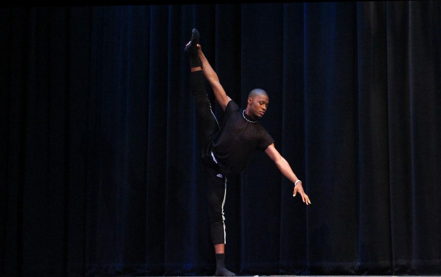 Dance sophomore Darius Hickman, winner of the Mr.Dreyfoos pageant hosted by A Prom to Remember: Operation Dreyfoos, performs his  dance routine for the talent portion of the contest. 