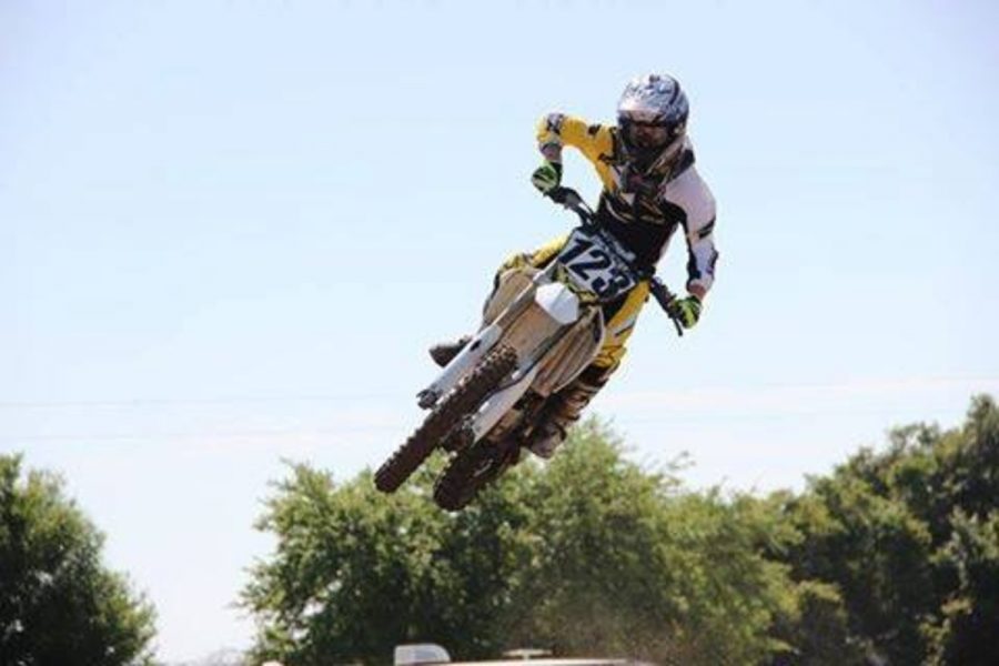 Visual junior Ryan DeVito mid-air at one of his motorcross races. 