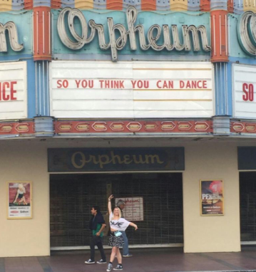 Dance senior Mycaela Everly poses in front of the theater where So You Think You Can Dance auditions were held.