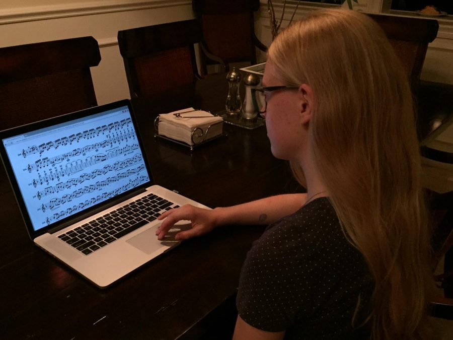 Strings sophomore Emily Winters studies her sheet music for her upcoming jury whenever she can.