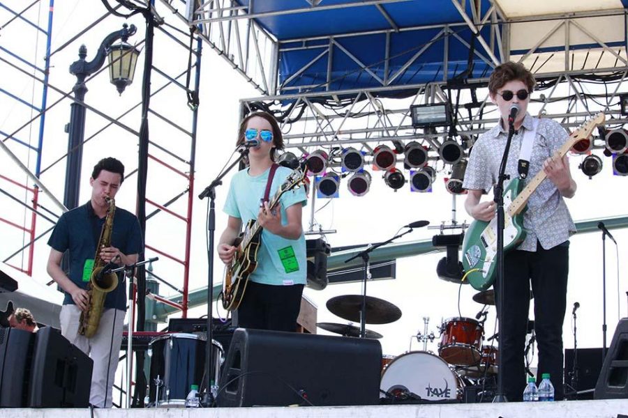 (L-R) Band sophomore Austin Klewan, Bak Middle School of the Arts eighth grader Dylan Thomas and theatre sophomore Ben Rothschild play saxophone, guitar and sing in their band Jumbo Shrimp. Only Klewan, Rothschild and theatre junior Angel Leiser attend Dreyfoos.
 
