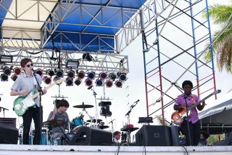 (L-R) Lead singer theatre sophomore Ben Rothschild, drummer Palm Beach Gardens High School junior John Cardillo III and theatre major and bass player Angel Leiser play at SunFest with their band, Jumbo Shrimp.