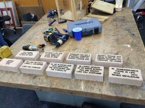 Some of the engraved bricks ready to be placed in the garden.