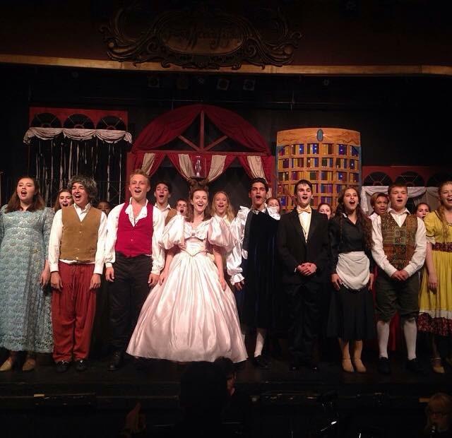 Suskauer (pictured in white) takes bows with the cast of Beauty and the Beast.