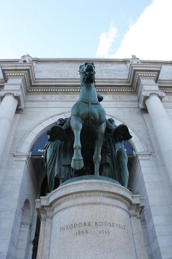 A bronze equestrian statue of Theodore Roosevelt stands before the American Museum of Natural History. The Museum can be found in the Upper West Side of Manhattan, New York City and is one of the largest in the world. 