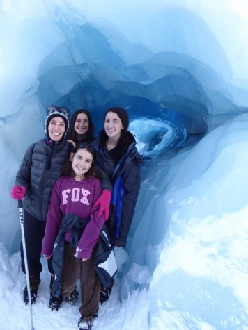Communications junior Tom Kapitulnik (right) with her family inside if an ice cave in Fox Glacier.