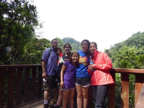 Communications junior Tom Kapitulnik (second from right) stands with her family in front of the forests of Monteverde, Costa Rica. 