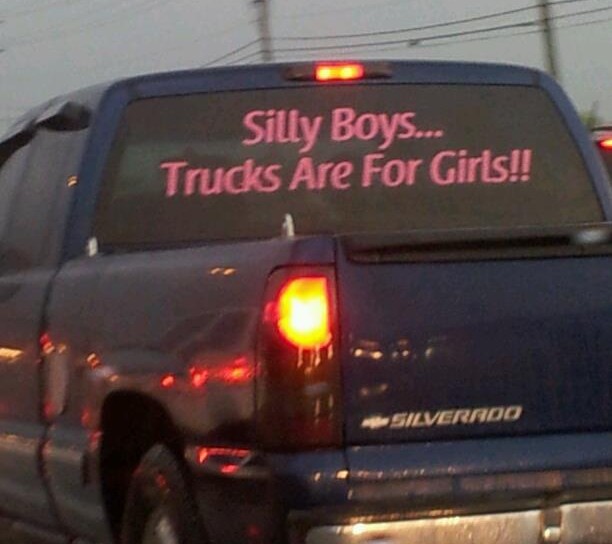 A silly boys, trucks are for girls bumper sticker personifies a drivers truck.