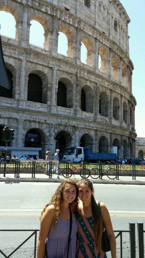 Communications junior Alana Gomez (left) stands alongside her sister in front of the Colosseum in Rome, Italy.  