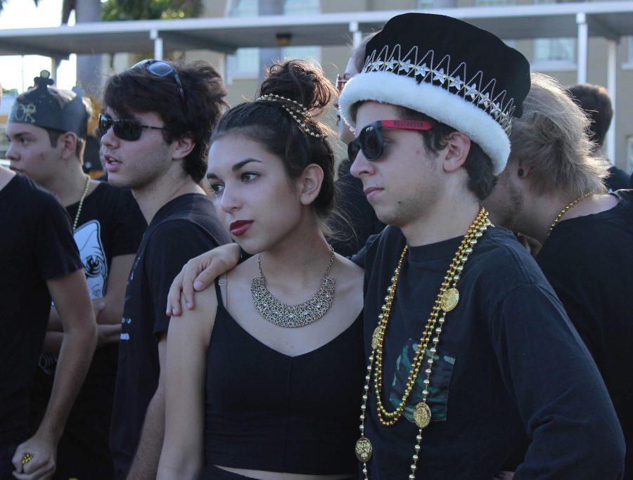 Visual seniors Daniella Rappel (left) and Palmer Crippen pose for a picture on Aug. 21 in the student parking lot during Senior Blackout.