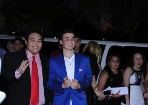 Co-Writers and directors of Imaginary Movie theatre junior Donnie O’Connor and band senior Geronimo Morales pose outside for photos at the Movies at Wellington theater Saturday night. The whole cast arrived in a limousine. “When we arrived there were photographers outside taking pictures of us walking in,” Morales said. “It means everything to me.”