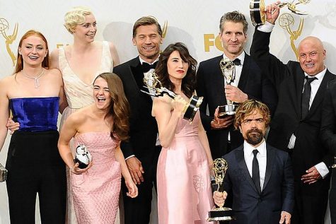 The cast of Game of Thrones accepts the award for outstanding drama series. Not only did Thrones snap its drama category runner-up streak, but the series picked up Emmys for outstanding supporting actor (Peter Dinklage), writing (David Benioff and Dan Weiss) and direction (David Nutter) on Sunday night. With a total of 12 Emmys this year (including eight won at the previously held Creative Arts Emmys), Thrones broke a major record by surpassing The West Wing to take home more TV Academy awards in a single year than any other show.