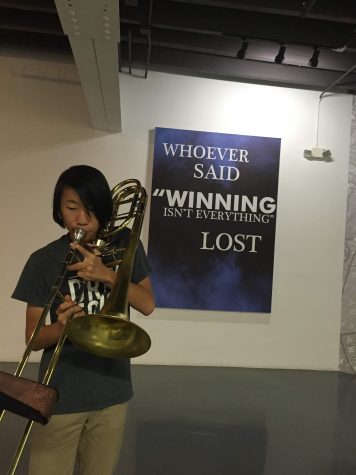 Band freshman Rocky Fox plays the trumpet at EmKo Palm Beach. "This is my passion. Being able to play not only at my school but in the public is great," Fox said.