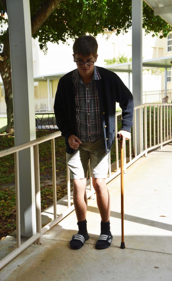 Band senior Ryan Hall makes his way to lunch dressed as an old man while participating in Senior Citizen Day. Senior Citizen Day is an annual Dreyfoos tradition where seniors dress up as the elderly.