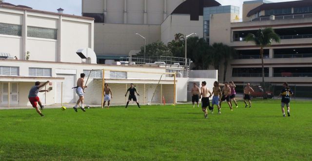  (L-R) Alumnus Stefan Gawlikowski (15) takes a shot while piano sophomore Josh Boss and visual sophomore Nadid Cruz try to block the shot. The current team beat the alumni team on penalty kicks 2-1, after a 3-3 draw after regular play had ended.