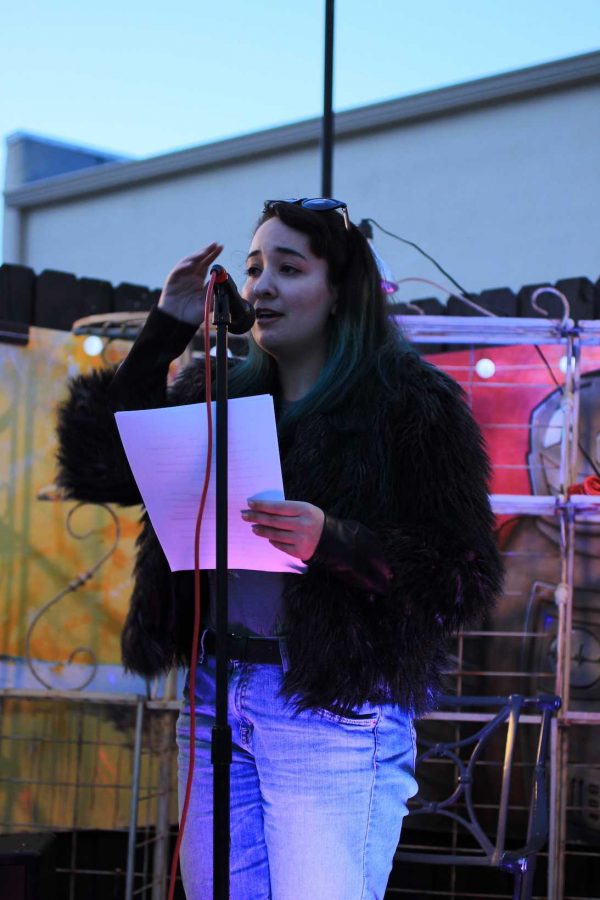 Communications senior Amanda Goodman presents original spoken word poetry at Seeds Second open mic night. 