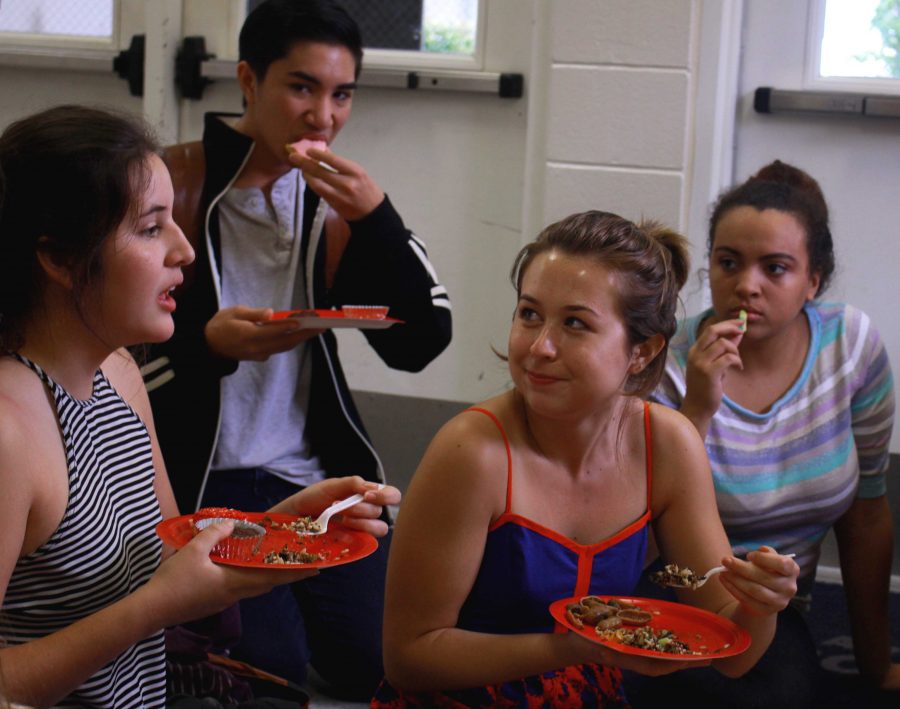 Digital senior Valentina Suarez (L-R), theatre sophomore Kai Horvit, visual senior Jessica Kian and theatre sophomore  Azure Kordick partake in an all vegan potluck lunch that was hosted in the gym on Feb. 16. Over 10 students brought vegan lunch and desserts, including quinoa and ice cream to share. 