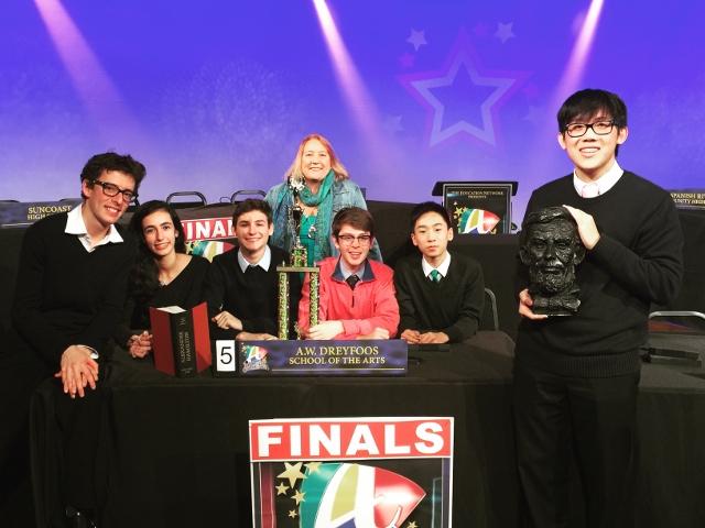 Dreyfoos Academic Games team, consisting of band senior Charles Comiter (L-R), piano senior Laura Bomeny, band senior Philipp Popp, band senior Ethan Weatherdon, communications junior Michael Wang, and piano junior Stefan Wan, won first place at the Academic Games against Atlantic, Suncoast, Spanish River, John I Leonard, and Wellington on Jan. 28. Social studies teacher Sara Stout (fourth from left) was their sponsor.