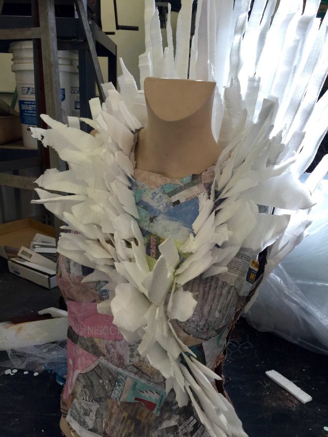 Visual sophomore Tiffany Breen is creating a sculpture of a paper mache female torso with styrofoam accessories. “It’s a piece starting to explore my concentration a little more,” Breen said. “I have discovered I like to create more interactive pieces, so wearable art is right up my alley.