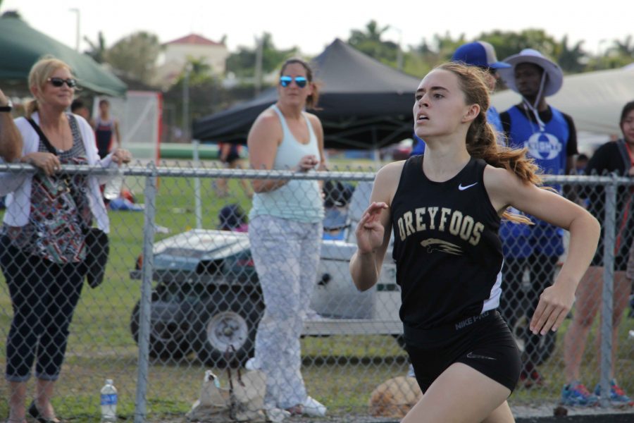 Theatre sophomore Madison Burmeister competes in a sprinting event at the track and field teams fifth meet held at The Kings Academy. In her 400m race she finished with a time of 1:06.