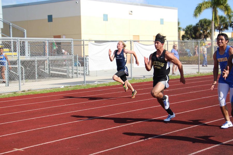 Communications+junior+Makoa+Beck+sprints+to+the+the+finish+line+in+the+100+meter+dash+event+at+the+district+track+and+field+meet+held+at+Suncoast+High+School.