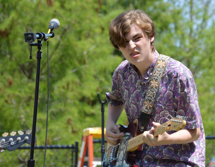 Theatre junior Ben Rothschild plays the guitar at the concert during lunch, presented by the Shift Club. I liked the fact that all the arts came together. It was really cool to see all the majors dancing and singing along to a bunch of cool bands. Absolutely surreal, Rothschild said. Various bands comprised of Dreyfoos students performed at this event while original art was sold.  