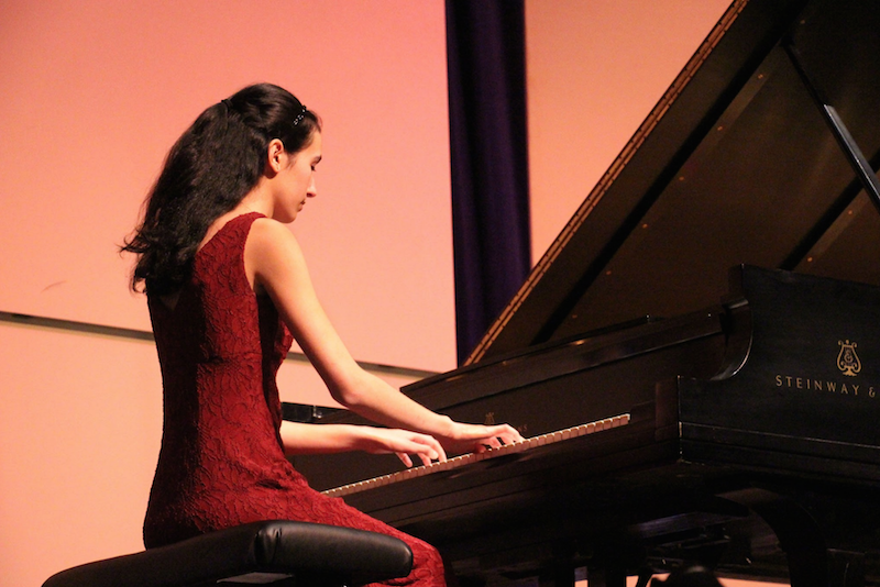 Piano senior and department president Laura Bomeny plays a solo piece in the Vierte piano concert in Meyer Hall on April 21. 

Unlike the other concerts that we put on in the spring, this one was in Meyer hall, as opposed to the Black Box, Bonemy said. This allowed us to play on the beautiful nine-foot Steinway piano and to receive a bigger audience.