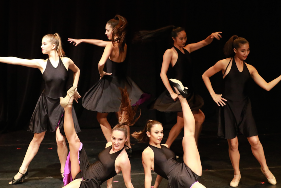 Dance sophomores and juniors perform “Love is a Tender Trap.” The routine was choreographed by dance junior Nicole Carroll. 
