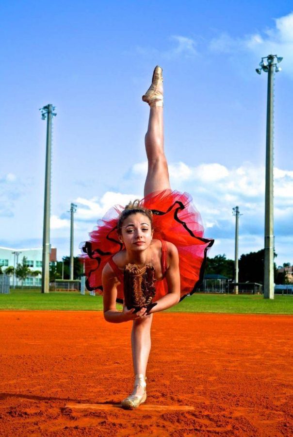 Dance senior Ryan wood posses for dance senior Hope Spears photo. This photo is well known by Dreyfoos students as it can be found in Seeds. Spears won Seeds Collaboration Award her sophomore year. This photograph also awarded Spears with the Dancers Among Us award by Jordan Matter.