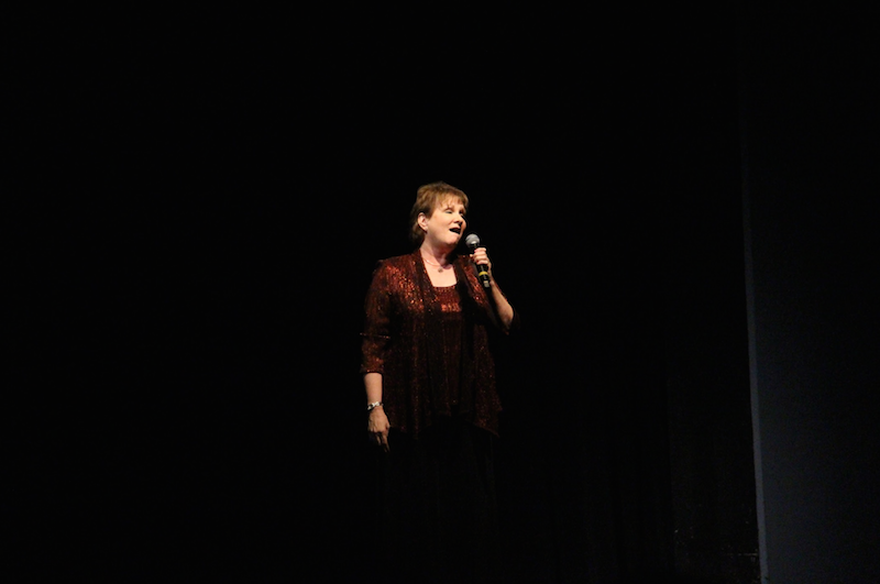 Vocal director Arlene Sparks sings a rendition of “Over the Rainbow,” for Mr. Sims at the Tribute Show on Friday, May 27. It is the final time that Sparks will perform on a Dreyfoos stage. 