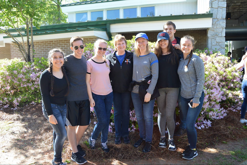 	(L-R) Vocal sophomore Alexa Burnston, vocal juniors Jared Freedland and Lauren Healey, vocal director Arlene Sparks, vocal juniors Morgan Healey, Makayla Forgione, Noah Gunn, and Alexandra Slusarenko at the WorldStrides Onstage Competition in Atlanta, Ga. The choir walked away with a first place victory, as well as adjudicator's choice.